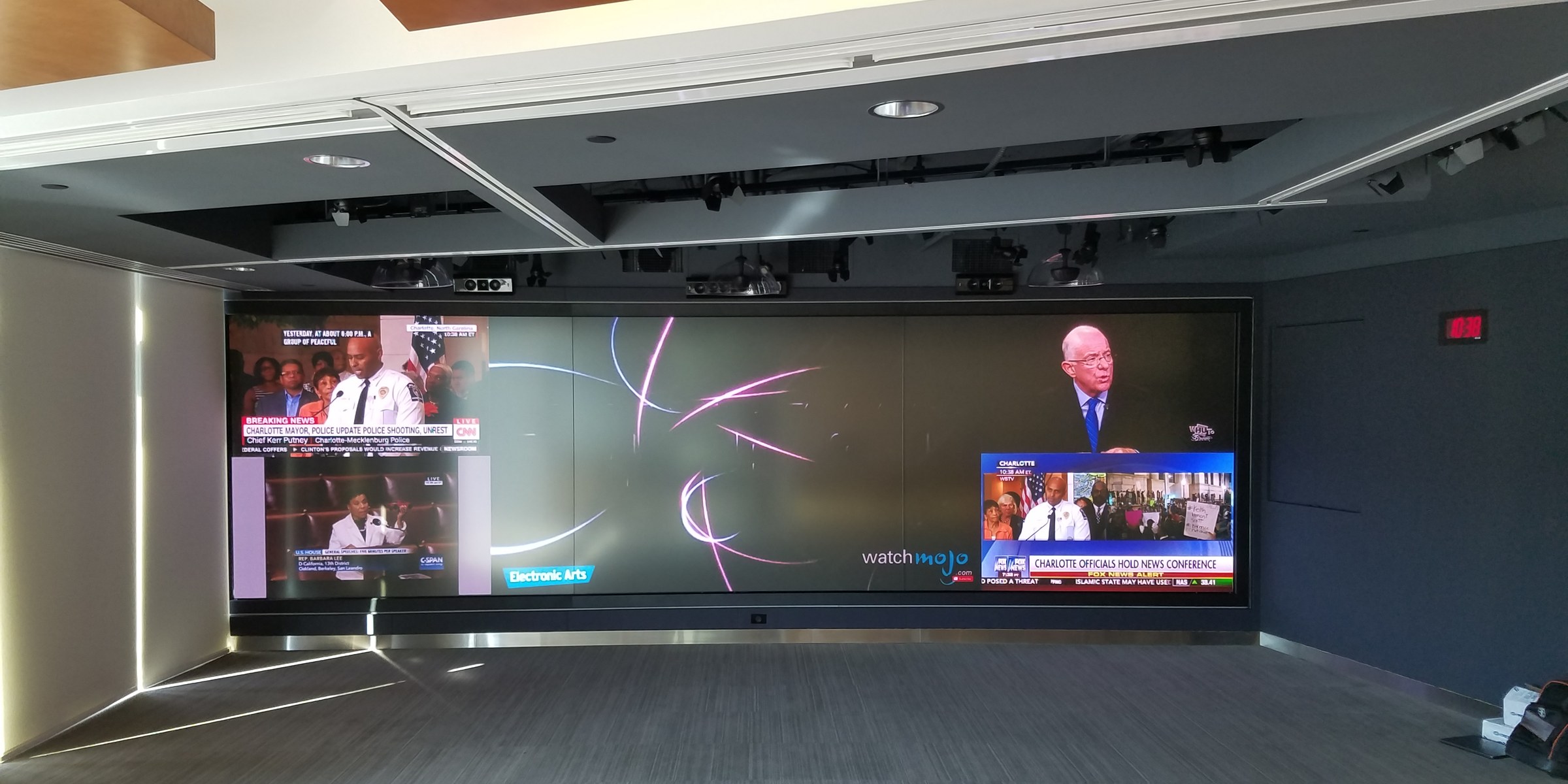 Confidential client experience center with a large interactive video wall